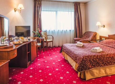 Hotel Sympozjum & SPA **** s polpenziou, odpočinkom v saune a pri masáži + dieťa zdarma.